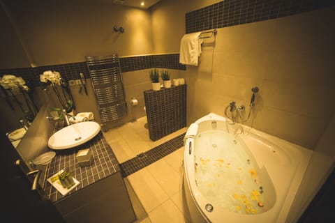 Deluxe Suite, Terrace, Sea View | Bathroom | Combined shower/tub, free toiletries, hair dryer, slippers