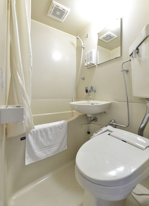 Combined shower/tub, free toiletries, hair dryer, bathrobes