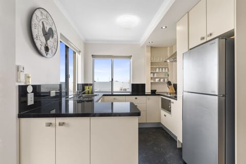 Two Bedroom Deluxe Apartment | Private kitchenette | Fridge, microwave, stovetop, dishwasher