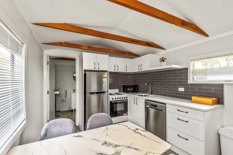 Cabin | Private kitchen | Full-size fridge, stovetop, toaster