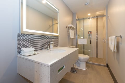 Room, 2 Queen Beds | Bathroom | Combined shower/tub, free toiletries, hair dryer, towels