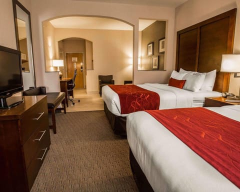 Suite (2 Queen beds and 1 Sofabed) | In-room safe, desk, iron/ironing board, free cribs/infant beds