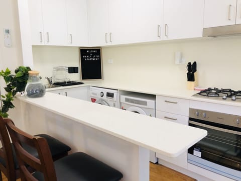 Comfort Apartment | Private kitchen | Full-size fridge, microwave, oven, stovetop