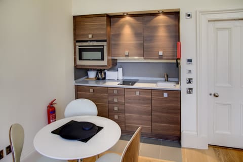 Superior Suite, 1 King Bed with Single Sofabed | Private kitchen | Fridge, microwave, stovetop, dishwasher