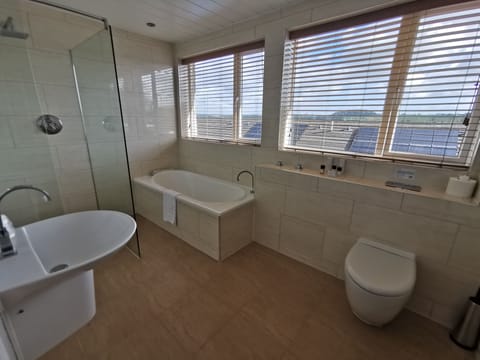 Superior Double Room | Bathroom | Designer toiletries, hair dryer, towels