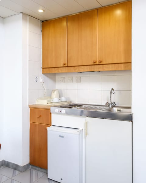 Condo, 2 Bedrooms, City View | Private kitchen | Fridge, microwave, stovetop, coffee/tea maker