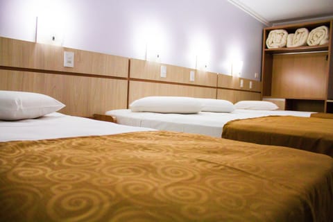 Quadruple Room, Multiple Beds | Minibar, in-room safe, desk, free WiFi