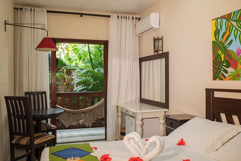 Suite, Balcony, Garden Area | Premium bedding, minibar, in-room safe, free WiFi