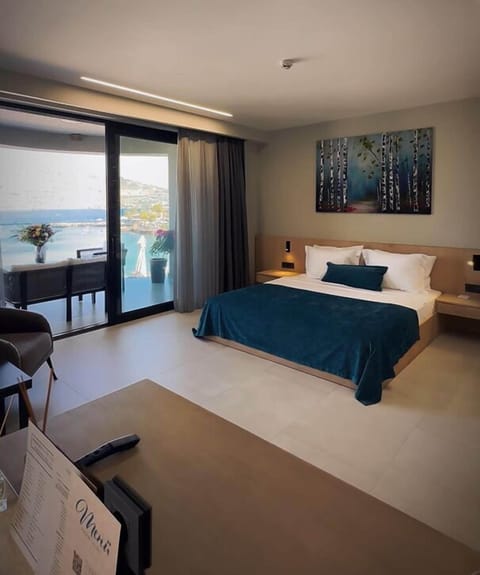 Premier Suite, Sea View | Premium bedding, minibar, in-room safe, individually decorated