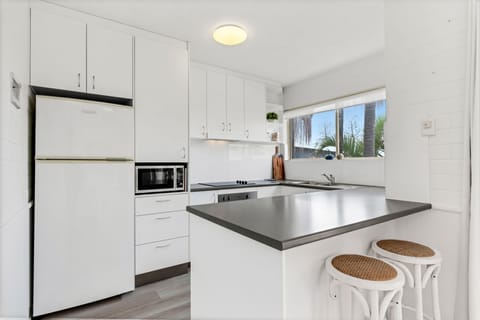 1 Bedroom Apartment with Ocean View | Private kitchen | Full-size fridge, microwave, oven, stovetop