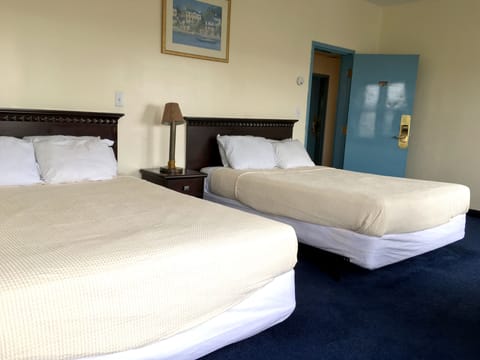 Standard Room, 2 Double Beds | Individually furnished, desk, free WiFi, bed sheets