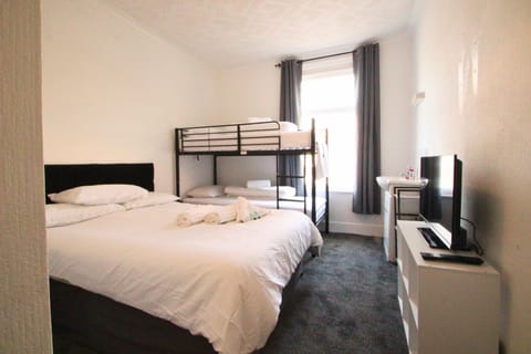 Family Room | Desk, iron/ironing board, free WiFi, bed sheets