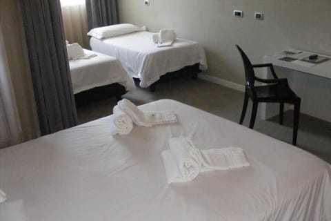 Quadruple Room | Minibar, in-room safe, cribs/infant beds, free WiFi