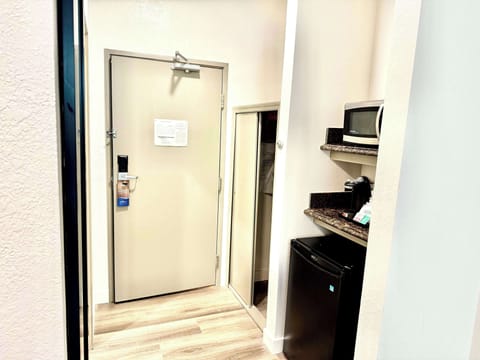 Suite, 1 King Bed, Non Smoking | Iron/ironing board, free cribs/infant beds, free WiFi, bed sheets