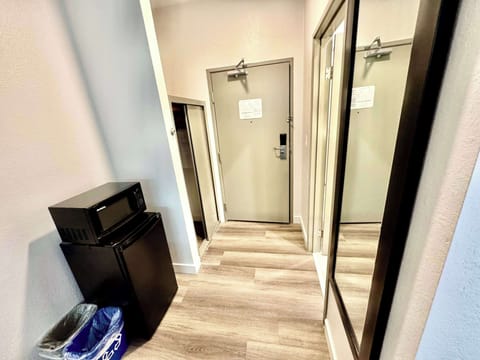 Room, 2 Queen Beds, Non Smoking | Iron/ironing board, free cribs/infant beds, free WiFi, bed sheets