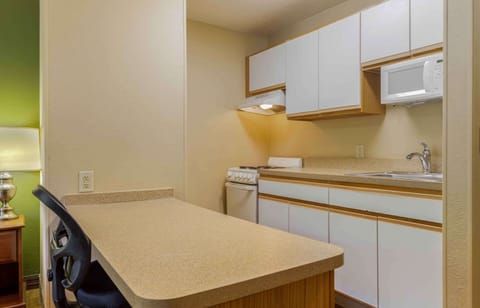 Studio, 1 Queen Bed, Non Smoking | Private kitchen | Full-size fridge, microwave, stovetop