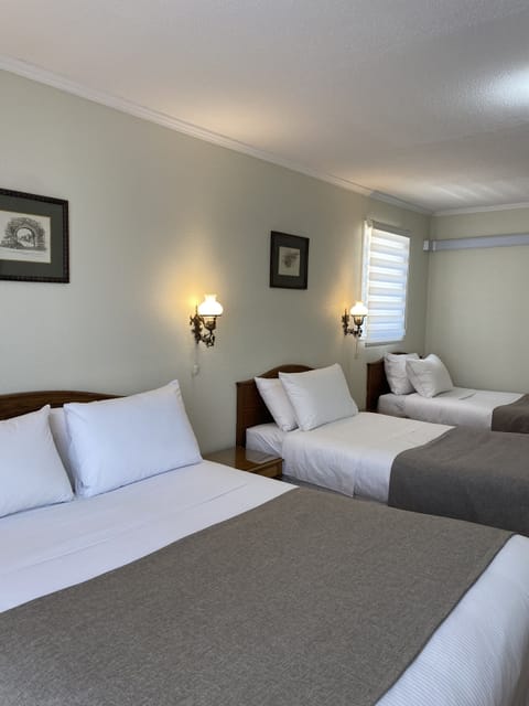 Family Quadruple Room | 1 bedroom, premium bedding, down comforters, Select Comfort beds