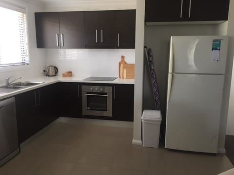 Family Apartment, 2 Bedrooms | Private kitchen | Fridge, electric kettle