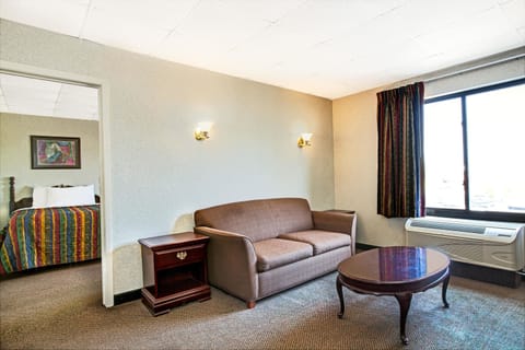 Suite, 1 Bedroom, Non Smoking | Desk, blackout drapes, iron/ironing board, free cribs/infant beds