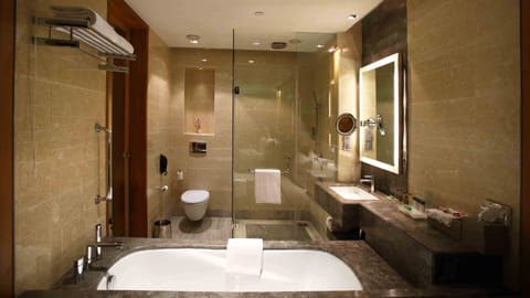 Suite, 1 Bedroom, Business Lounge Access | Bathroom | Shower, free toiletries, hair dryer, bathrobes