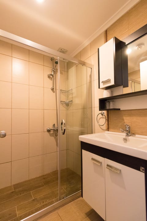 Suite, 1 Double Bed with Sofa bed | Bathroom | Shower, hair dryer, slippers, towels