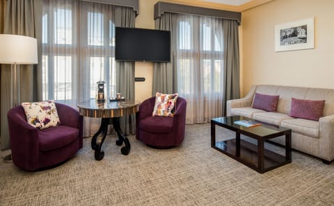 Shattuck Suite | Living room | 37-inch flat-screen TV with cable channels, TV, streaming services