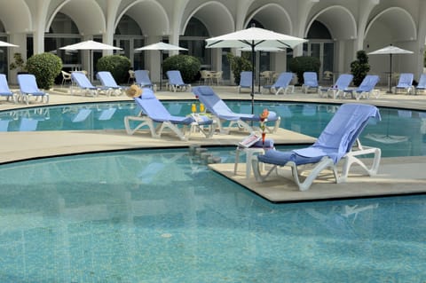 Seasonal outdoor pool, open 10 AM to 6 PM, pool umbrellas, sun loungers