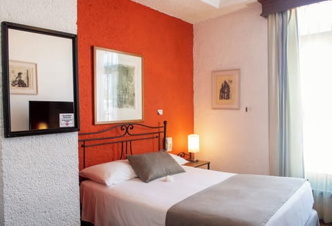 Standard Room, 1 Double Bed | Minibar, in-room safe, individually decorated, desk