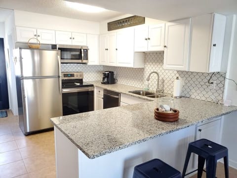 Condo, Multiple Beds, Balcony, Ocean View | Private kitchen | Fridge, microwave, stovetop, dishwasher