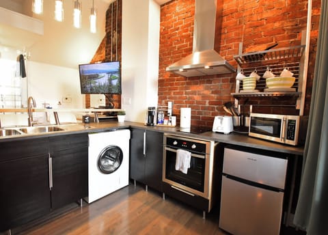 Studio Loft - Suite 202 | Private kitchen | Microwave, stovetop, coffee/tea maker, cookware/dishes/utensils