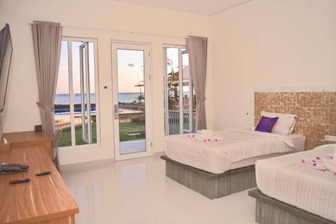 Deluxe Double or Twin Room, Sea View | Beach/ocean view