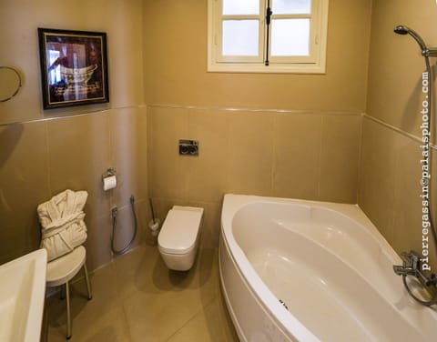 Prestige Suite, 2 Bedrooms | Bathroom | Shower, free toiletries, hair dryer, towels