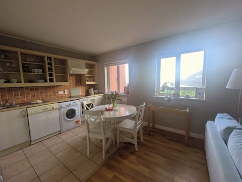 Comfort Apartment | Private kitchen | Coffee/tea maker, electric kettle, cookware/dishes/utensils