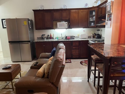 Adorable 1 Bedroom | Private kitchen | Microwave, cookware/dishes/utensils, paper towels, dining tables