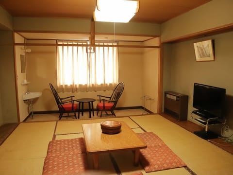 Japanese Style Room for 4 Guests with Shared Bathroom and Toilet | In-room safe, iron/ironing board