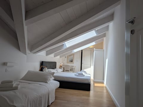 Family Triple Room | Individually decorated, individually furnished, desk, blackout drapes