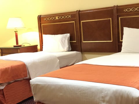 Deluxe Twin Room | Desk, iron/ironing board, free WiFi, bed sheets