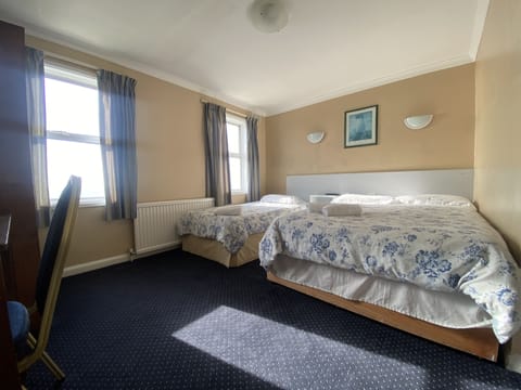 Family Triple Room, Multiple Beds | Desk, free WiFi, bed sheets