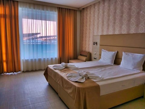 Standard Double Room, Balcony, Sea View | Blackout drapes, iron/ironing board, free WiFi, bed sheets