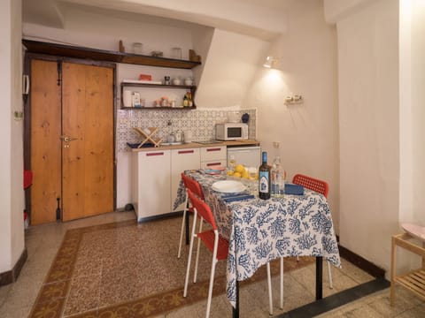 Economy Apartment, 2 Bedrooms, Partial Sea View | Private kitchenette | Full-size fridge, stovetop, coffee/tea maker, cookware/dishes/utensils