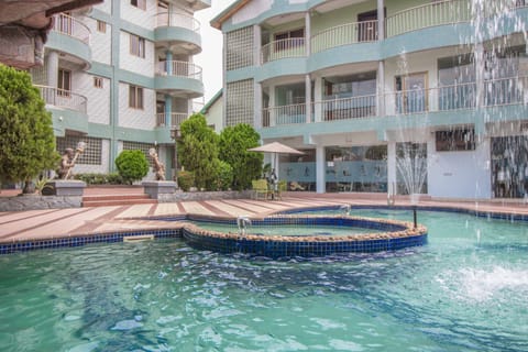 Outdoor pool, pool umbrellas, sun loungers