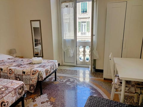 Quadruple Room, Shared Bathroom | Desk, free cribs/infant beds, free WiFi, bed sheets