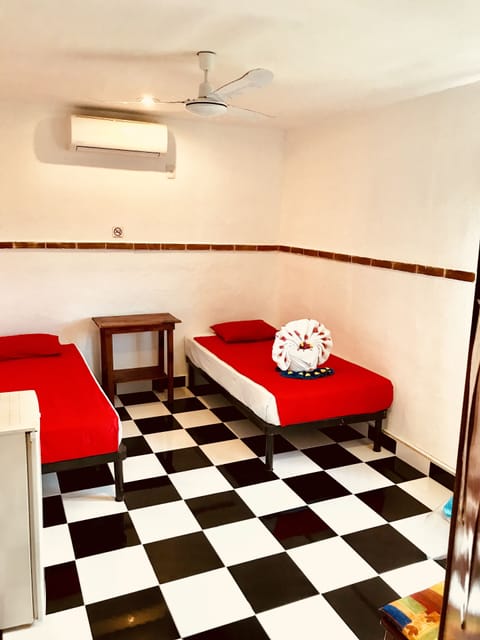 Economy Double or Twin Room | Minibar, desk, iron/ironing board, free WiFi