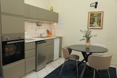 City Apartment, 1 Bedroom, Balcony | Private kitchen | Fridge, microwave, stovetop, coffee/tea maker