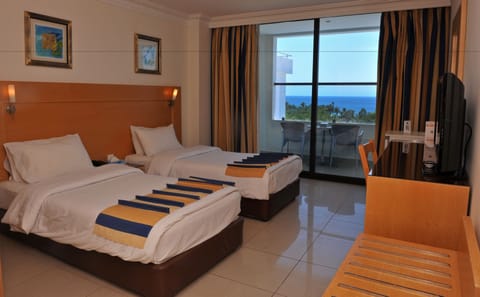 Standard Twin Room with Balcony Sea View | Pillowtop beds, free minibar items, in-room safe, desk