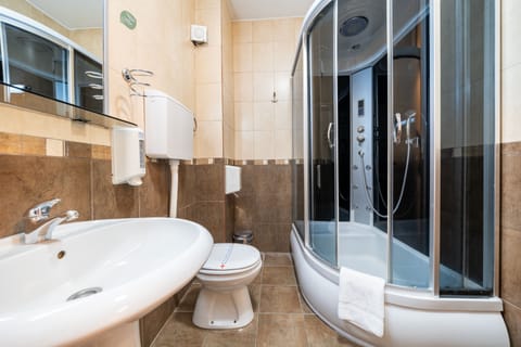 Superior Apartment | Bathroom | Shower, hair dryer, bathrobes, slippers