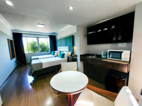 Double Room, Corner | Living area | Flat-screen TV