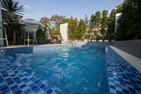 Outdoor pool, sun loungers