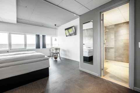 Laptop workspace, iron/ironing board, cribs/infant beds, free WiFi