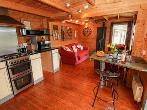 Cottage | Private kitchen | Microwave, stovetop, dishwasher, highchair